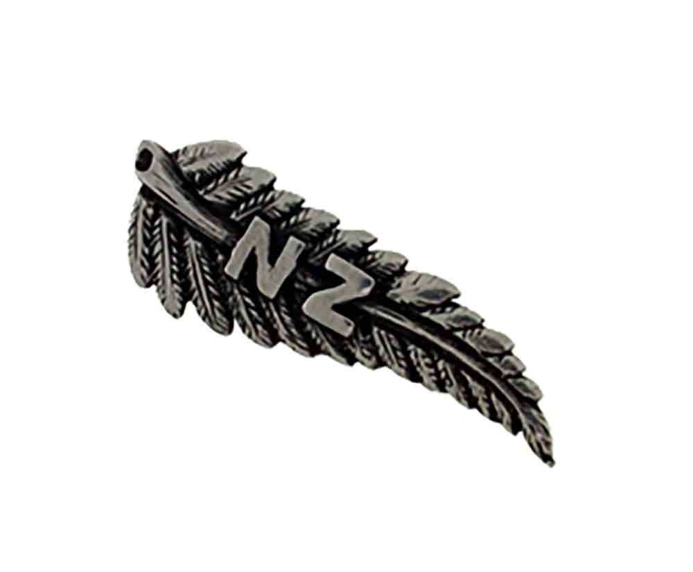 Brooch pewter fern with n z