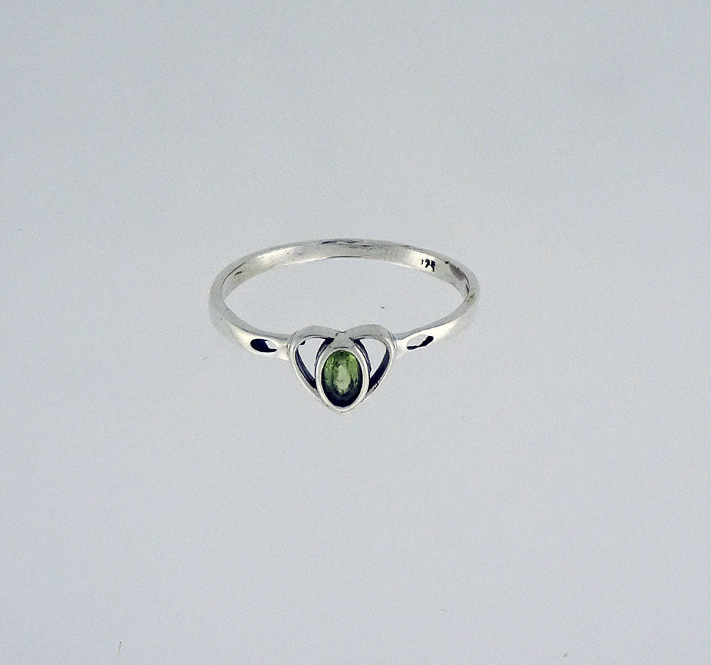 RPE506S Peridot 7x8 oval Faceted Heart Shape Ring