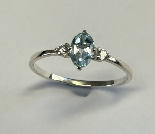 RBT100S      Blue Topaz Facet 6x4mm & CZ Ring